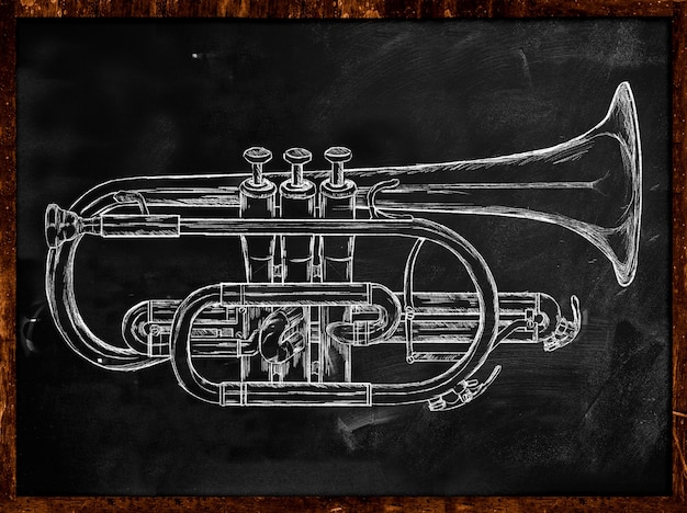 Free photo trumpet sketch on blackboard