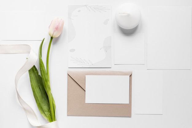 Free photo tulip beside wedding card