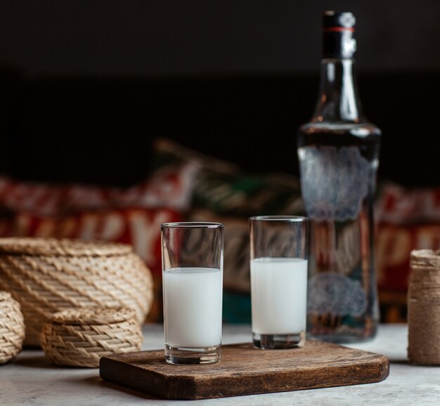 Turkish alcohol drink raki, vodka, in two small glasses.