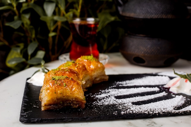 Turkish baklava with nuts sprinkled with sorbet