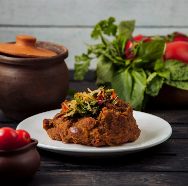 Turkish chig kofte with meat and herbs.