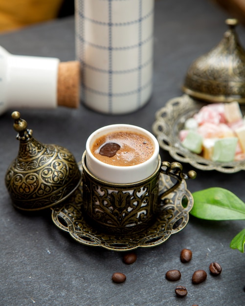 Turkish coffee served in ornated cup