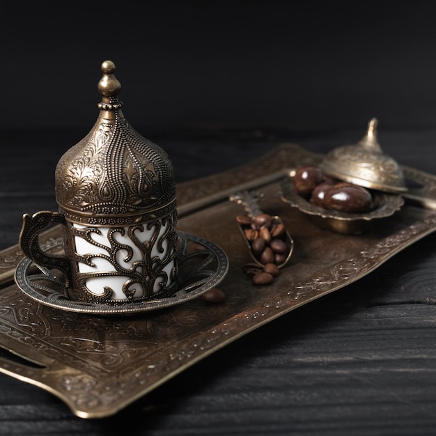 Free Photo turkish cup of coffee on silver plate