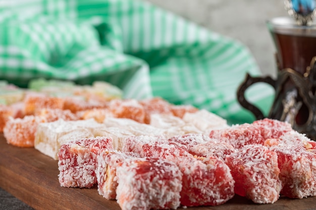 Turkish delight lokum on the wooden board