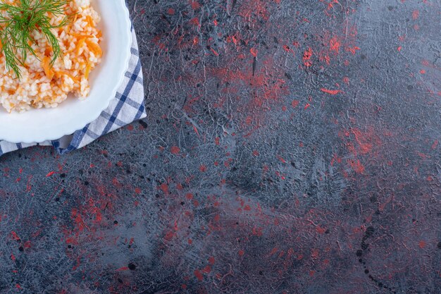 Turkish menemen in a white plate with herbs. 