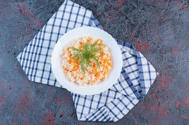 Turkish menemen with herbs in a white plate. 