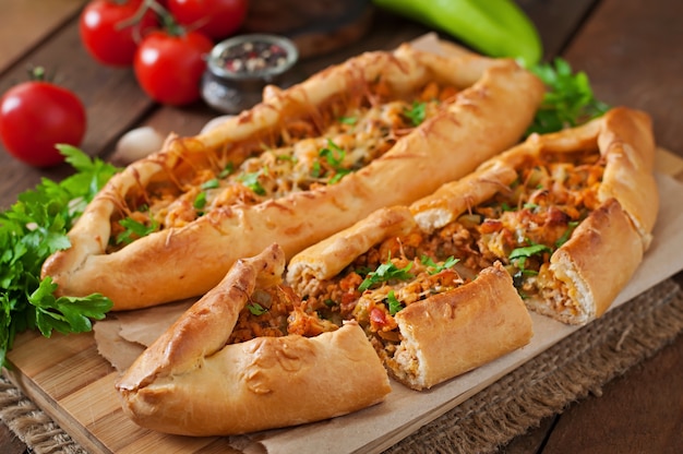 Turkish pide traditional food with beef and vegetables