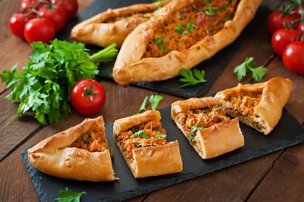 Turkish pide traditional food with beef and vegetables