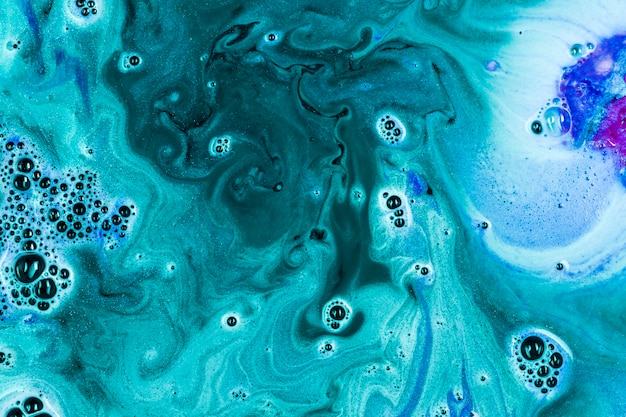 Free Photo turquoise water with bath bomb