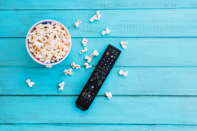 TV remote control and popcorn