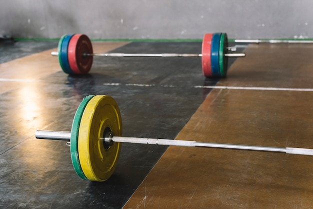 Free Photo two barbells in gym