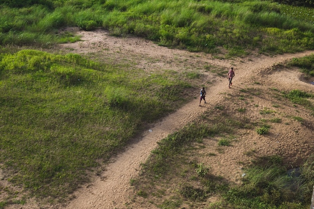 Two boys going down to the river