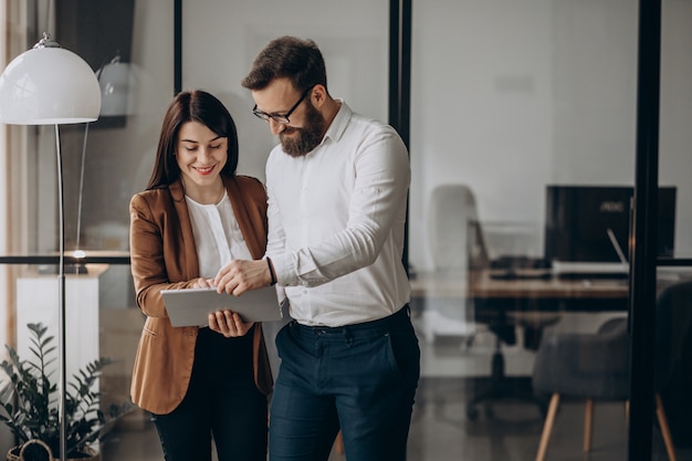 Two business partners working in office