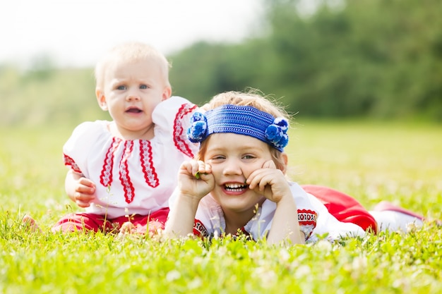 Two children in traditional folk clothes