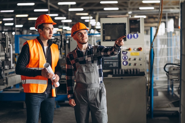 Free photo two colleagues at a factory