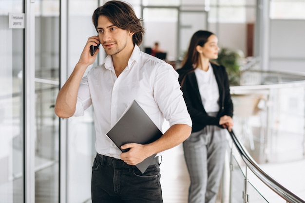 Two collegues working in a business center