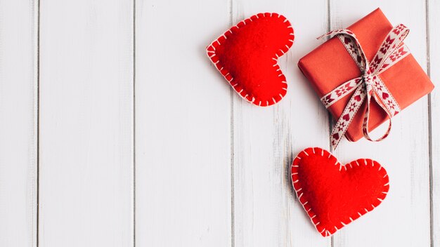 Two fabric hearts and gift box