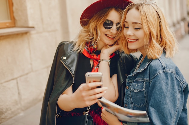 Free Photo two fashion girls in a city