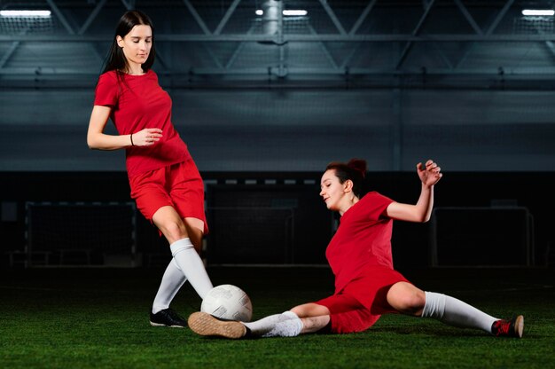 Two female football players