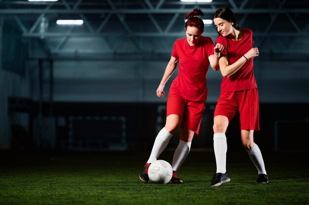 Two female football players