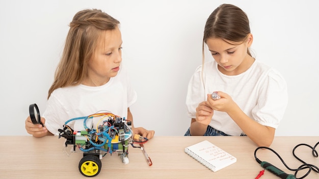 Two friends doing science experiments together