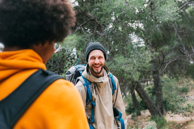 Free photo two friends hiking together