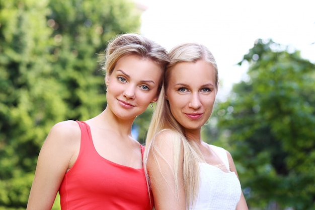 Two girls are having fun in the park