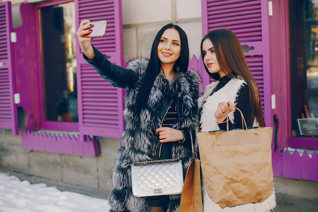 Two girls in a city