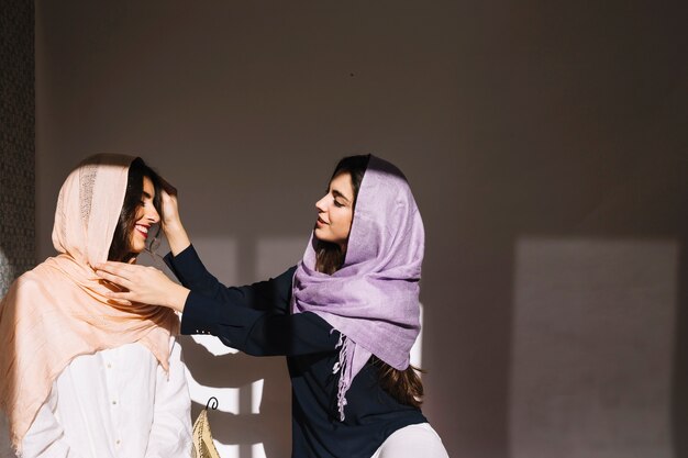 Two muslim women talking