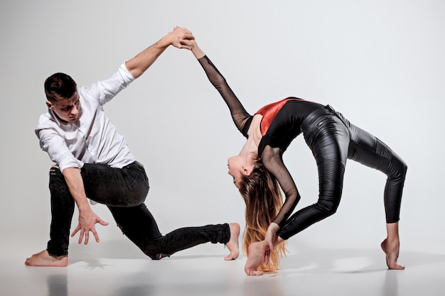 Two people dancing in contemporary stile