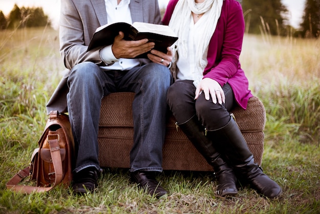 Two people sitting beside each other