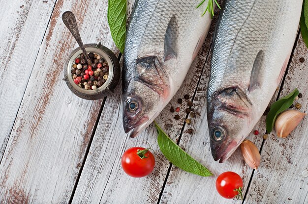 Two raw seabass with spices