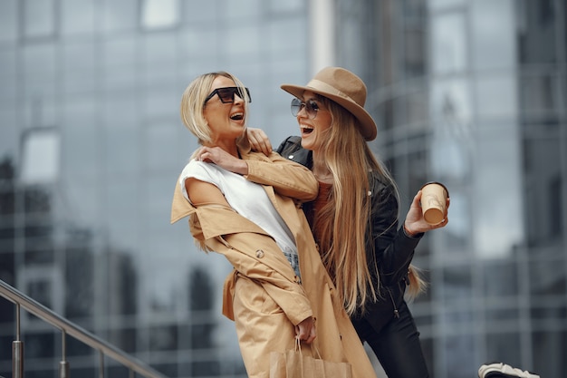 Free photo two women standing in a autumn city