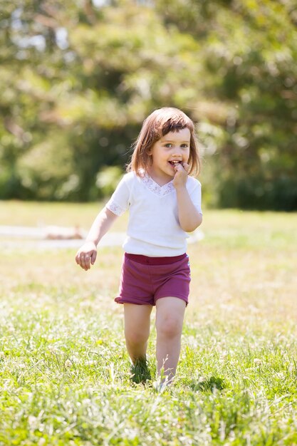 Two-year baby girl in summer