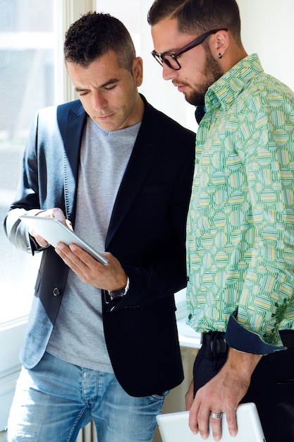 two young workers at office