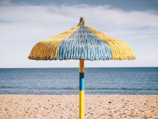 Free photo typical beach umbrella in torremolinos, spain