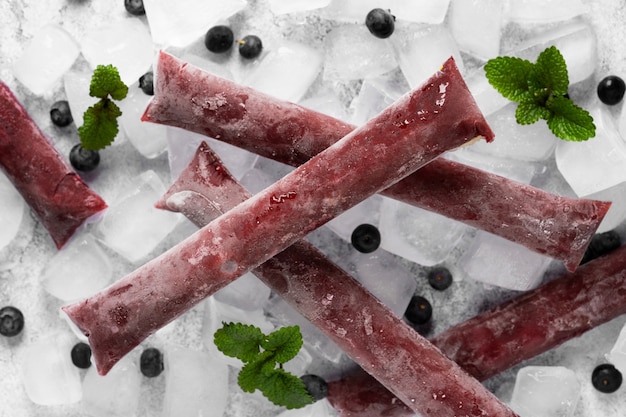 Free photo typical brazilian freezies with fruits still life