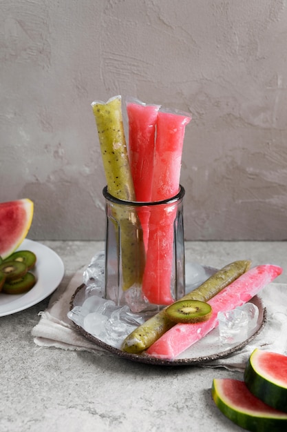 Free photo typical brazilian freezies with fruits still life