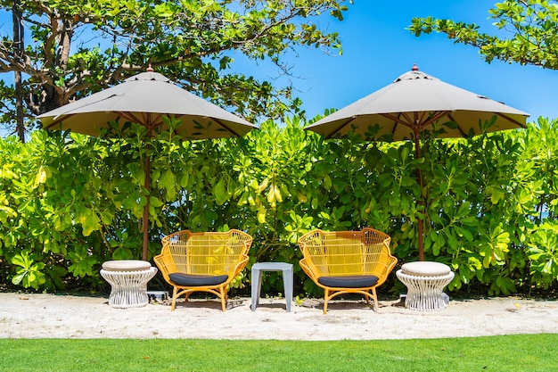 Umbrella and chair on the beach and sea with blue sky