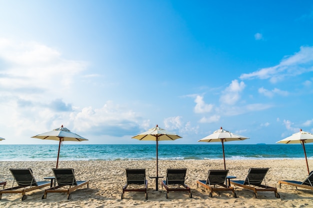 Umbrella and chair on the beach and sea