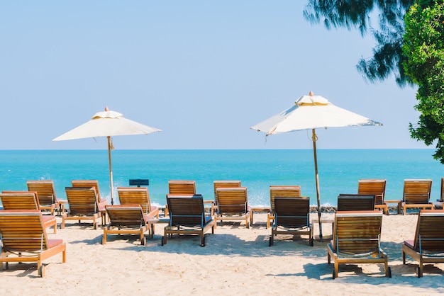 Free Photo umbrella pool and chair on the beach