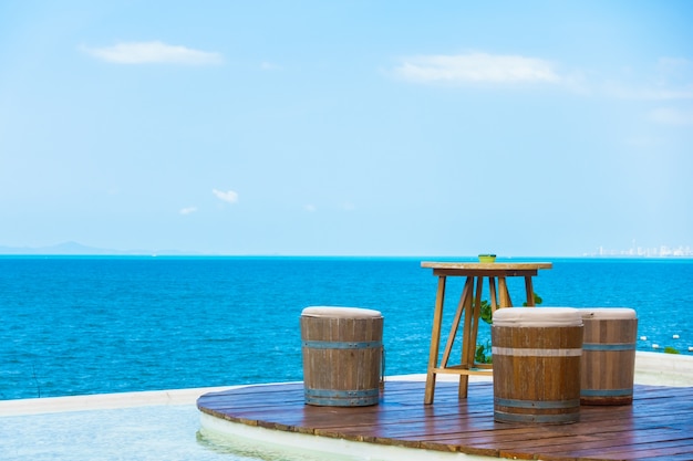 Free Photo umbrella summer empty table travel