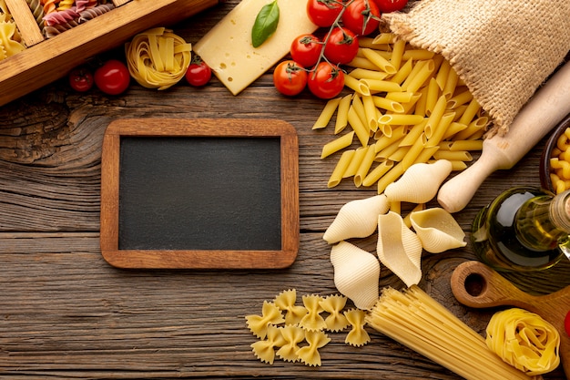 Uncooked mix of pasta with blackboard mock-up