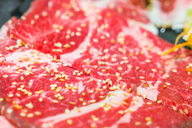 Uncooked raw fresh beef .