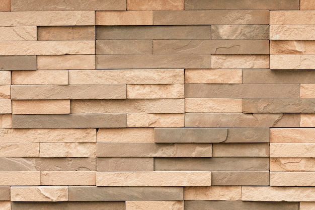 Free photo uneven sandstone tile for wall surface