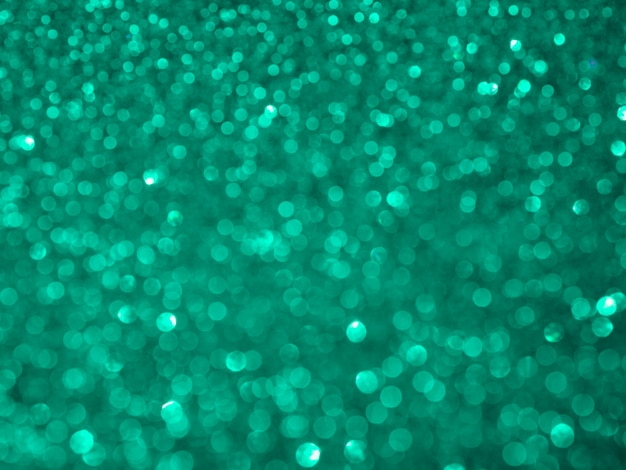 Unfocused turquoise glitter background