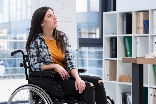 Unhappy woman in wheelchair