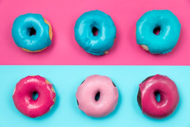 Free Photo unhealthy donuts assortment top view