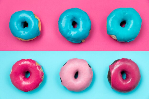 Unhealthy donuts assortment top view