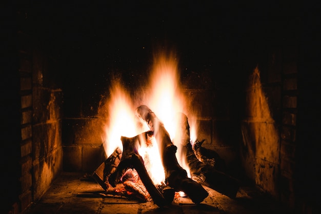 Unique shot of an indoor flamy fireplace